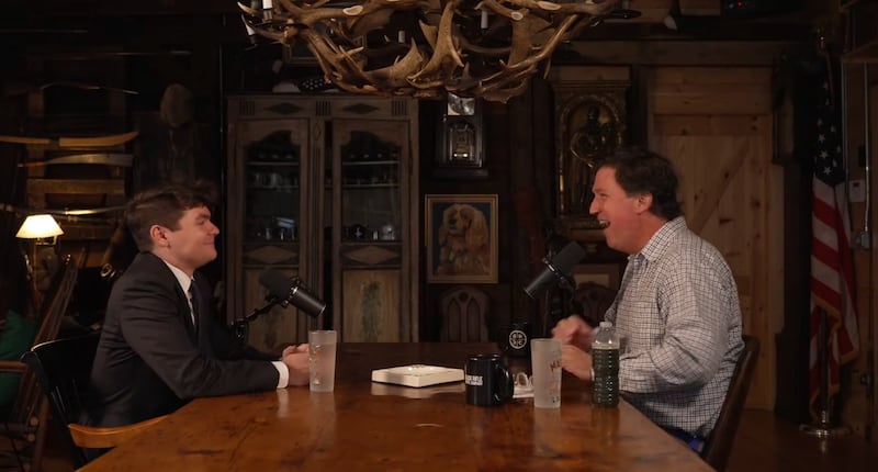 Nick Fuentes, 27, and Tucker Carlson, 56, were all smiles during their more-than-two-hour interview last week.