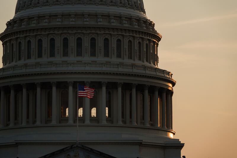 An American flag waves at the U.S. Capitol Building as the sun sets on June 10, 2025 in Washington, D.C.