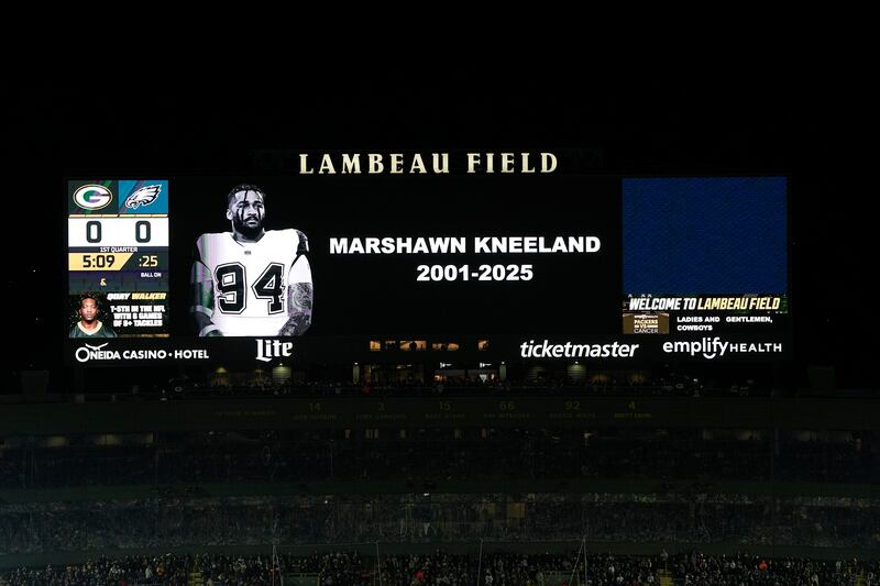 GREEN BAY, WISCONSIN - NOVEMBER 10: A moment of silence is held for Marshawn Kneeland prior to the game between the Philadelphia Eagles and the Green Bay Packers at Lambeau Field on November 10, 2025 in Green Bay, Wisconsin. (Photo by Patrick McDermott/Getty Images)