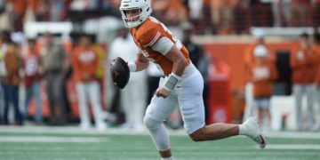 Manning throws 3 touchdowns and No. 20 Texas holds of No. 9 Vanderbilt late for 34-31 win