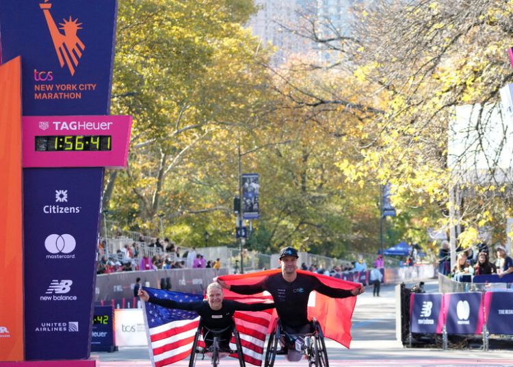 Marcel Hug and Susannah Scaroni Are the Wheelchair Winners, Again.