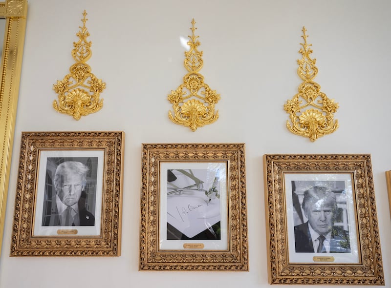 White House RenovationsFramed portraits of US President Donald Trump flank a image of former US President Joe Biden's signature and an autopen along 