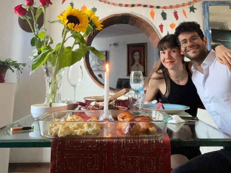 Catherine Work and her boyfriend at dinner table