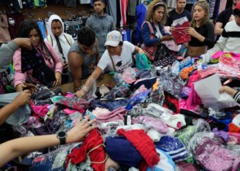 Hurry up and wait: Venezuelans try to prepare for U.S. attack