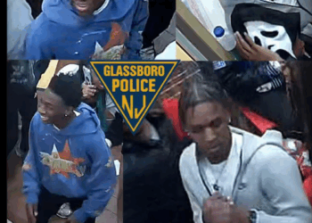 Pair of punks caught on video chucking chair at cops — hitting one in back of head — during Domino’s Pizza brawl: Police