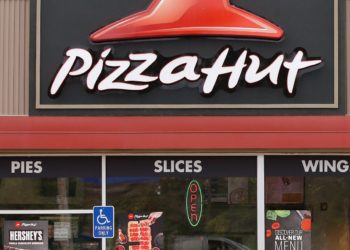 Pizza Hut’s parent company says it’s considering selling the chain