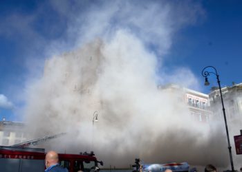 Rescuers work to reach worker trapped in medieval tower that partially collapsed in Rome