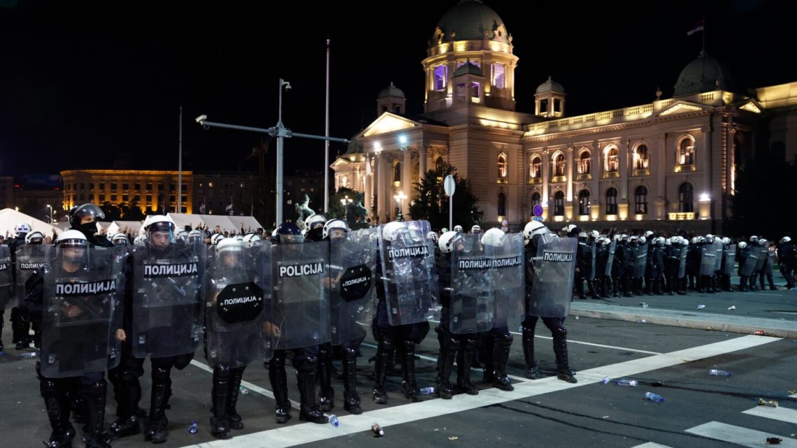 Riot police separate opponents, loyalists of Serbia’s president as tensions soar amid protests