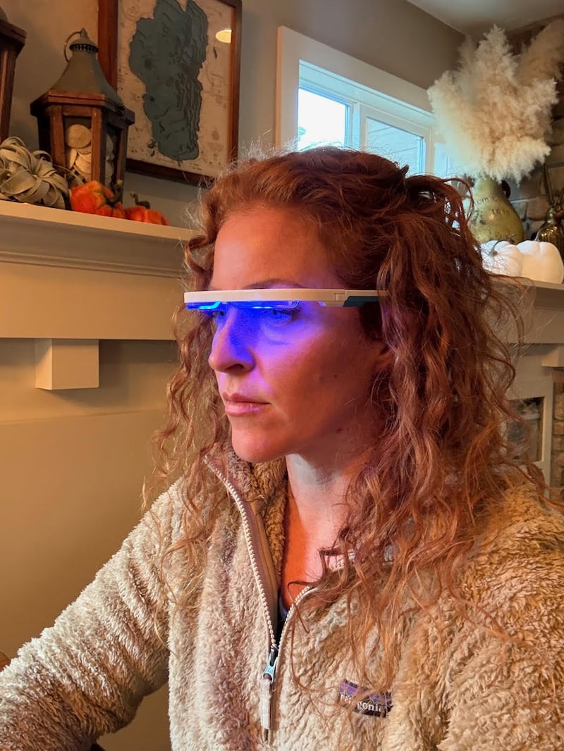 The writer in her AYO glasses.