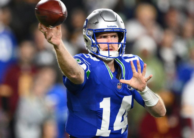 Sam Darnold leads Seahawks to easy 38-14 win over Commanders, who lose Jayden Daniels to arm injury