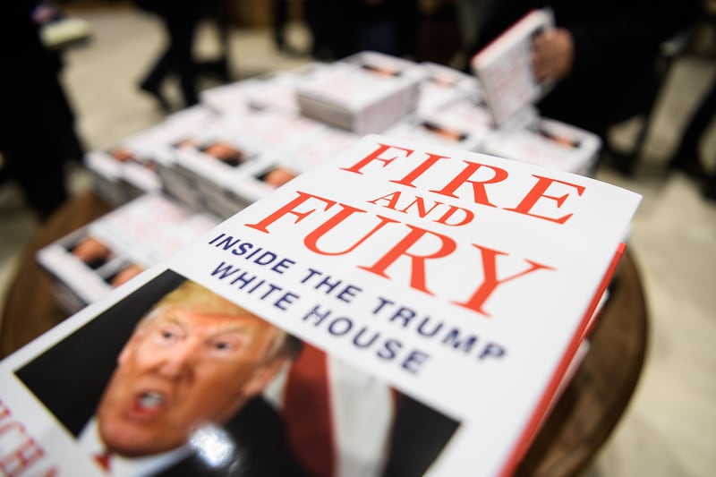 LONDON, ENGLAND - JANUARY 09: Customers purchase copies of one of the first UK consignments of Michael Wolff's book on President Trump's Presidency