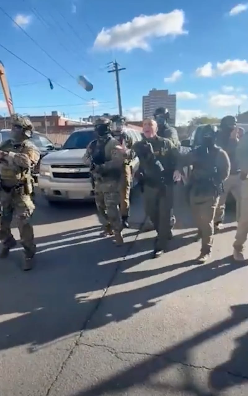 Border Patrol Chief Greg Bovino throws tear gas in Little Village, Chicago, Illinois.
