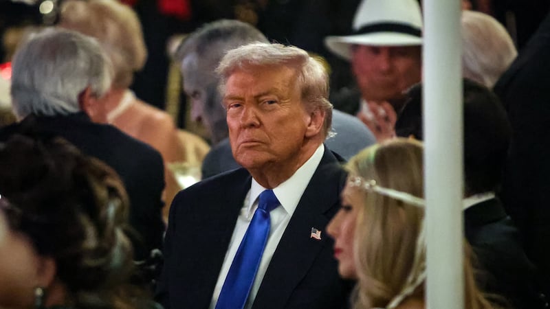 PALM BEACH, FLORIDA - OCTOBER 31: US President Donald Trump talks with guests during a Halloween party at his Mar-a-Lago estate on October 31, 2025 at Palm Beach, Florida. Trump is spending the weekend at his Mar-A-Lago estate in Palm Beach, Florida. (Photo by Samuel Corum/Getty Images)