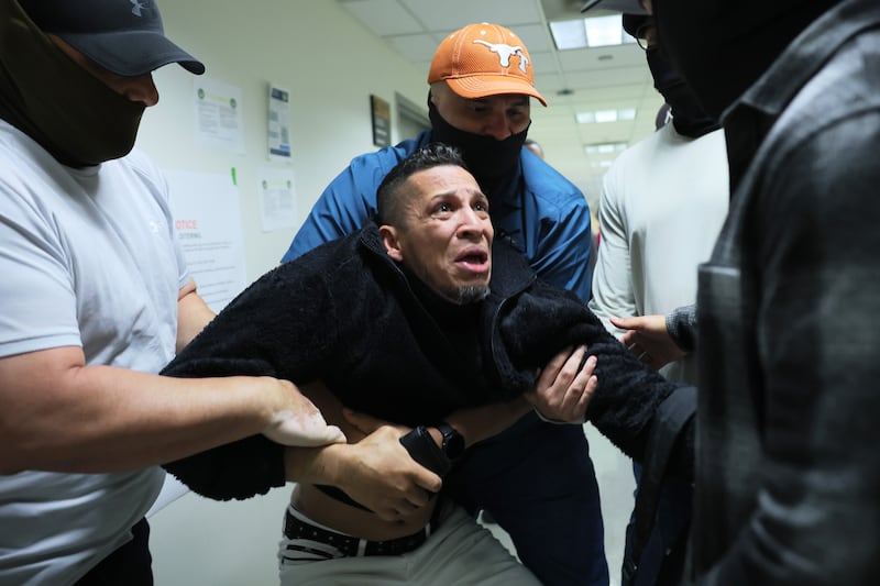 A man seeking asylum from Colombia is detained by federal agents as he attends his court hearing