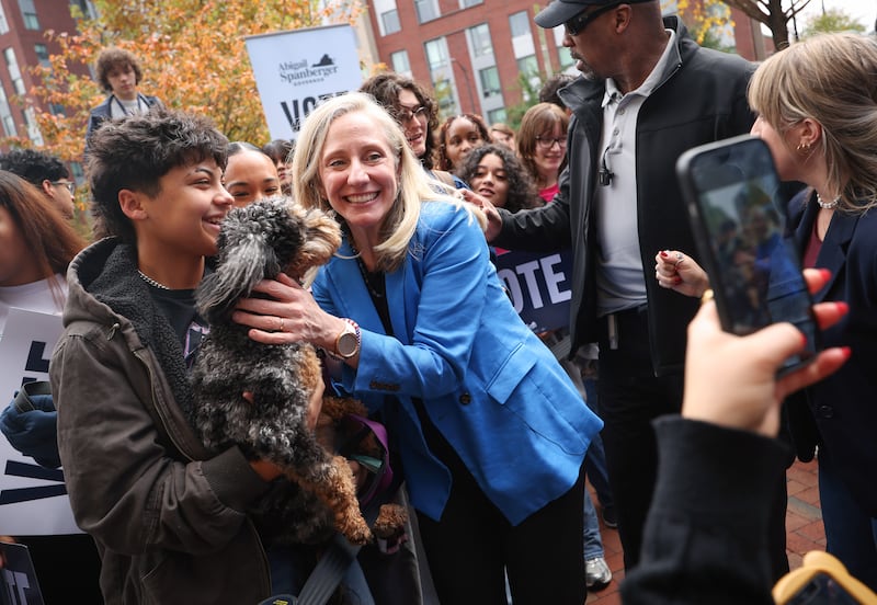 Virginia Democratic gubernatorial nominee former Rep. Abigail Spanberger poses for a photograph with a supporter during a rally at Virginia Commonwealth University on November 3, 2025 in Richmond, Virginia.