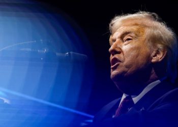 Trump touts his economic agenda a day after heavy GOP election losses