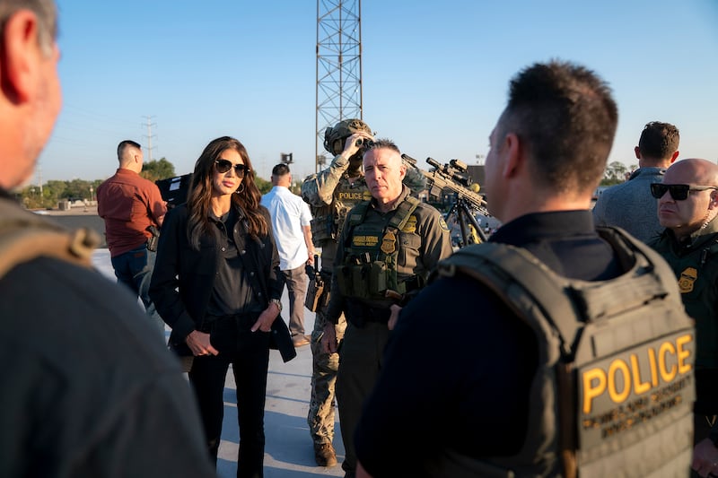 Secretary of Homeland Security Kristi Noem and Border Patrol Commander Greg Bovino visits with U.S. Immigration and Customs Enforcement officers at the ICE facility in Chicago to observe enforcement operations, Oct. 3, 2025.