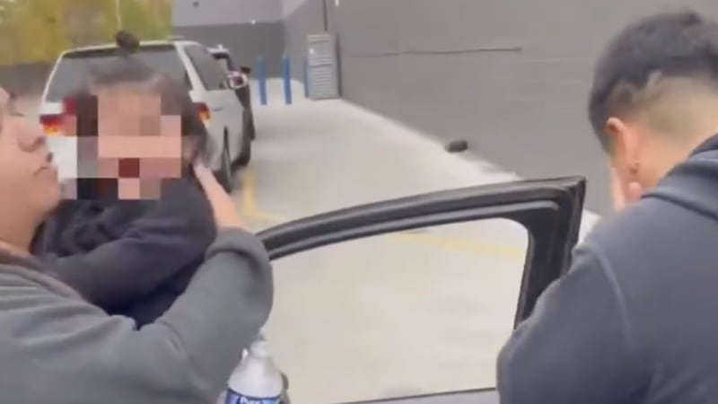 The family tries to wash pepper spray out of their eyes after their car was pepper-sprayed by federal agents on November 8, 2025.