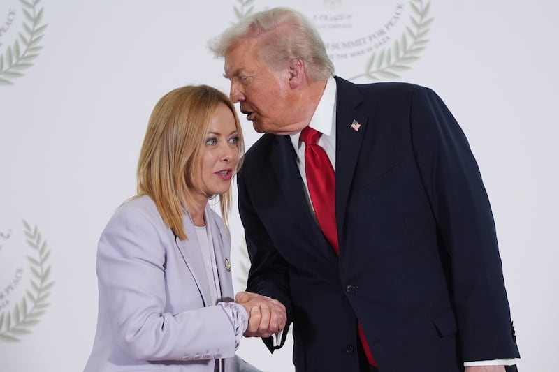 SHARM EL SHEIKH, EGYPT - OCTOBER 13: U.S. President Donald Trump (R) greets Italy's Prime Minister Giorgia Meloni during a summit of European and Middle Eastern leaders on October 13, 2025 in Sharm El Sheikh, Egypt. President Trump is in Egypt to meet with European and Middle Eastern leaders in what’s being billed as an international peace summit, following the start of a US-brokered ceasefire deal to end the war in the Gaza Strip. (Photo by Evan Vucci - Pool/Getty Images)