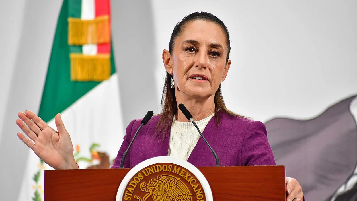 Video appears to show possibly drunken man trying to grope and kiss Mexican president in public