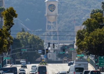 Warner Bros. Discovery reports a loss as sale process heats up