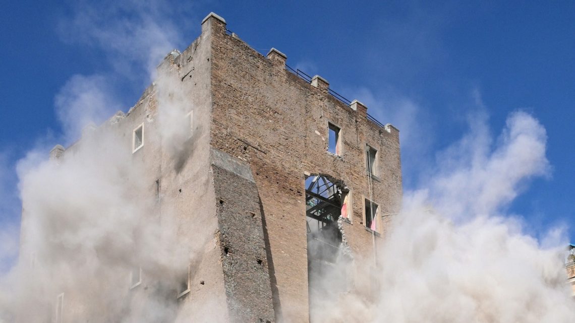 Worker trapped for 11 hours after collapse of medieval tower in central Rome
