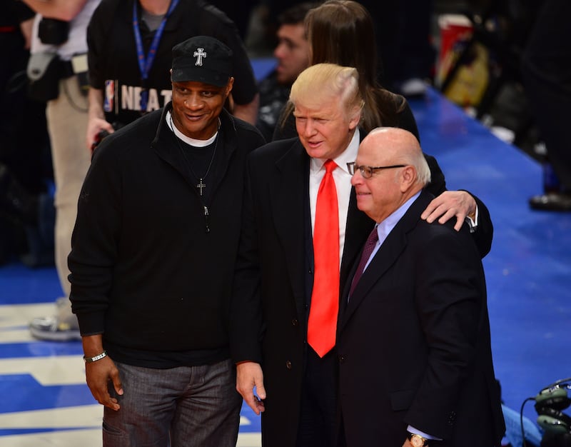 NEW YORK, NY - MARCH 26:  Darryl Strawberry, Donald Trump and guest attend the Milwaukee Bucks vs New York Knicks game at Madison Square Garden on March 26, 2012 in New York City.