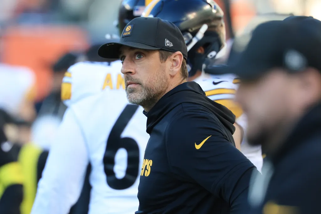 Aaron Rodgers #8 of the Pittsburgh Steelers looks on during the fourth quarter of a game against the Chicago Bears at Soldier Field on November 23, 2025 in Chicago, Illinois.