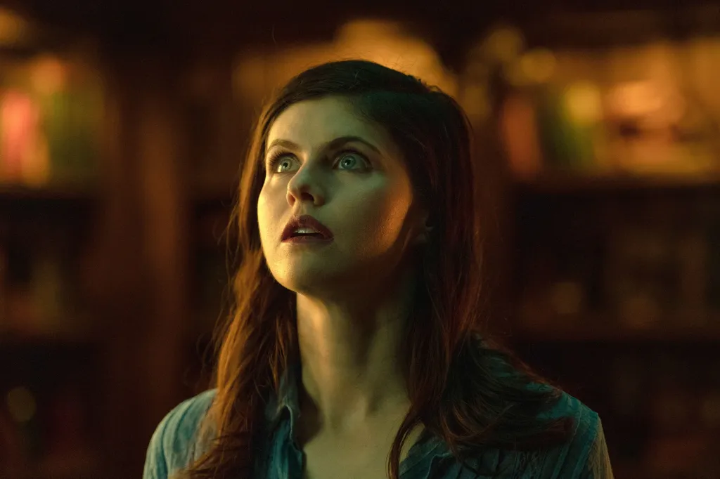 Alexandra Daddario as Rowan Mayfair looking up with an open mouth in 