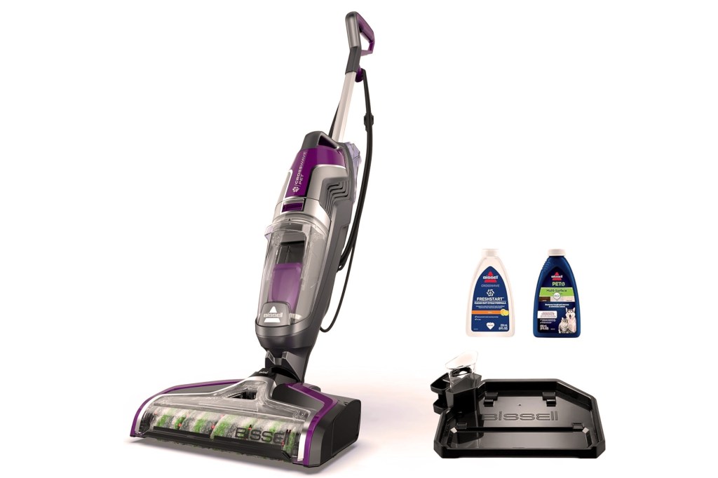 Bissell Crosswave Pet Pro vacuum, cleaning tray, and two bottles of cleaning solution.