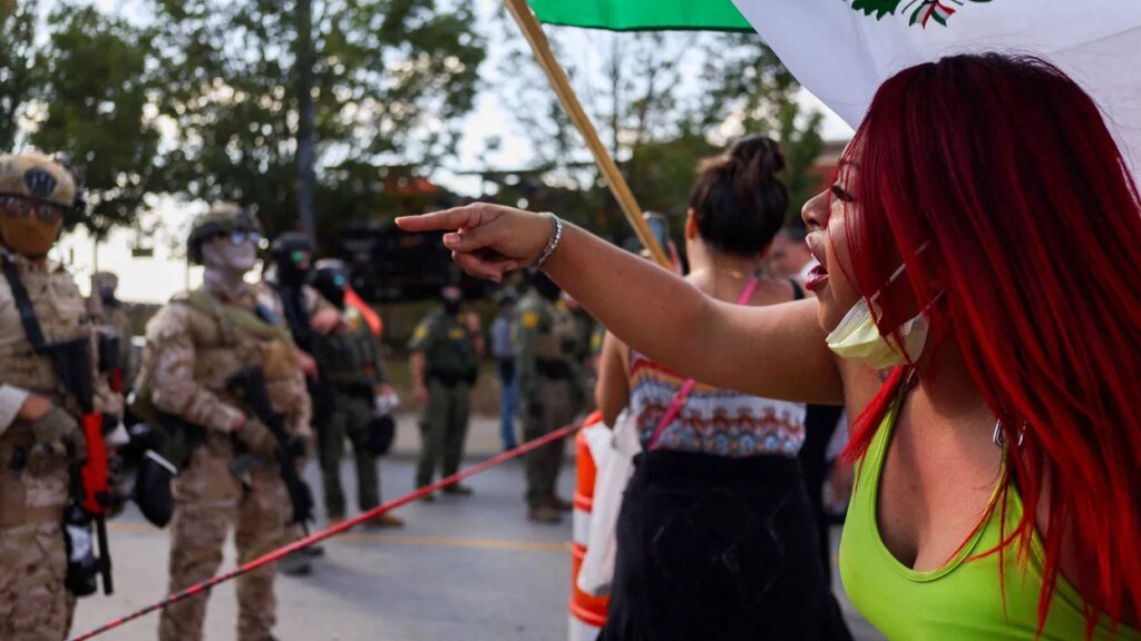 ‘We protect our own’: Chicago parents stand up to ICE despite threat of gas and violence