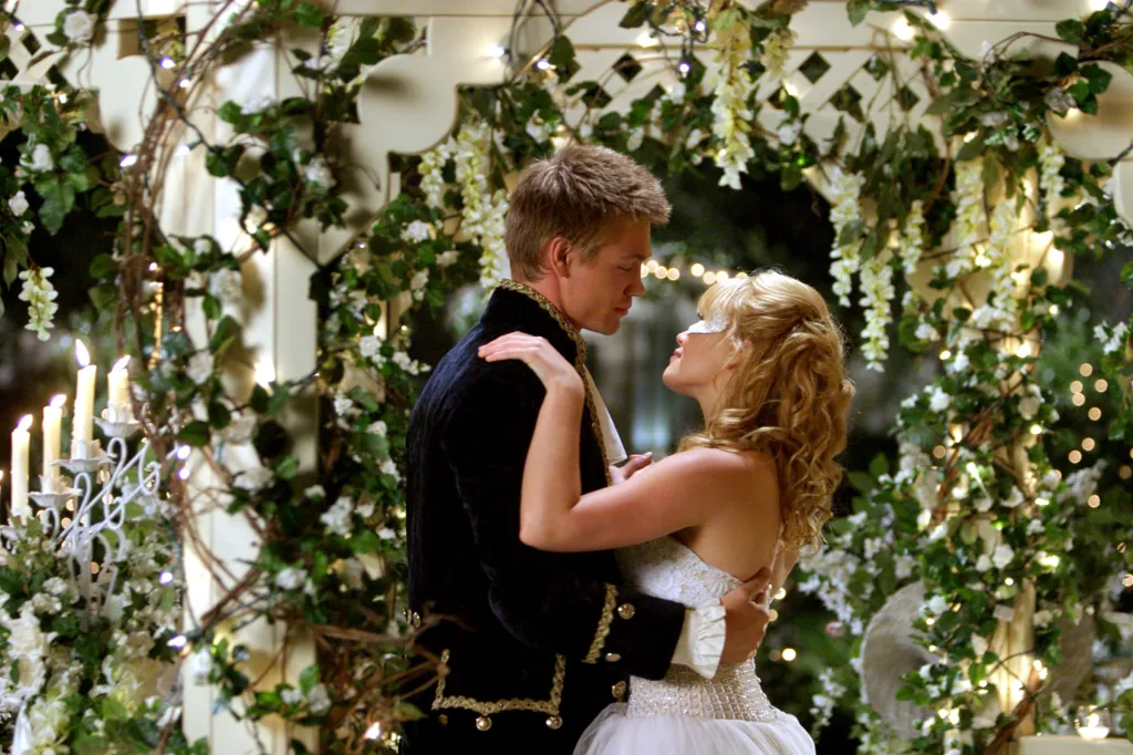Chad Michael Murray and Hilary Duff embrace in A Cinderella Story.