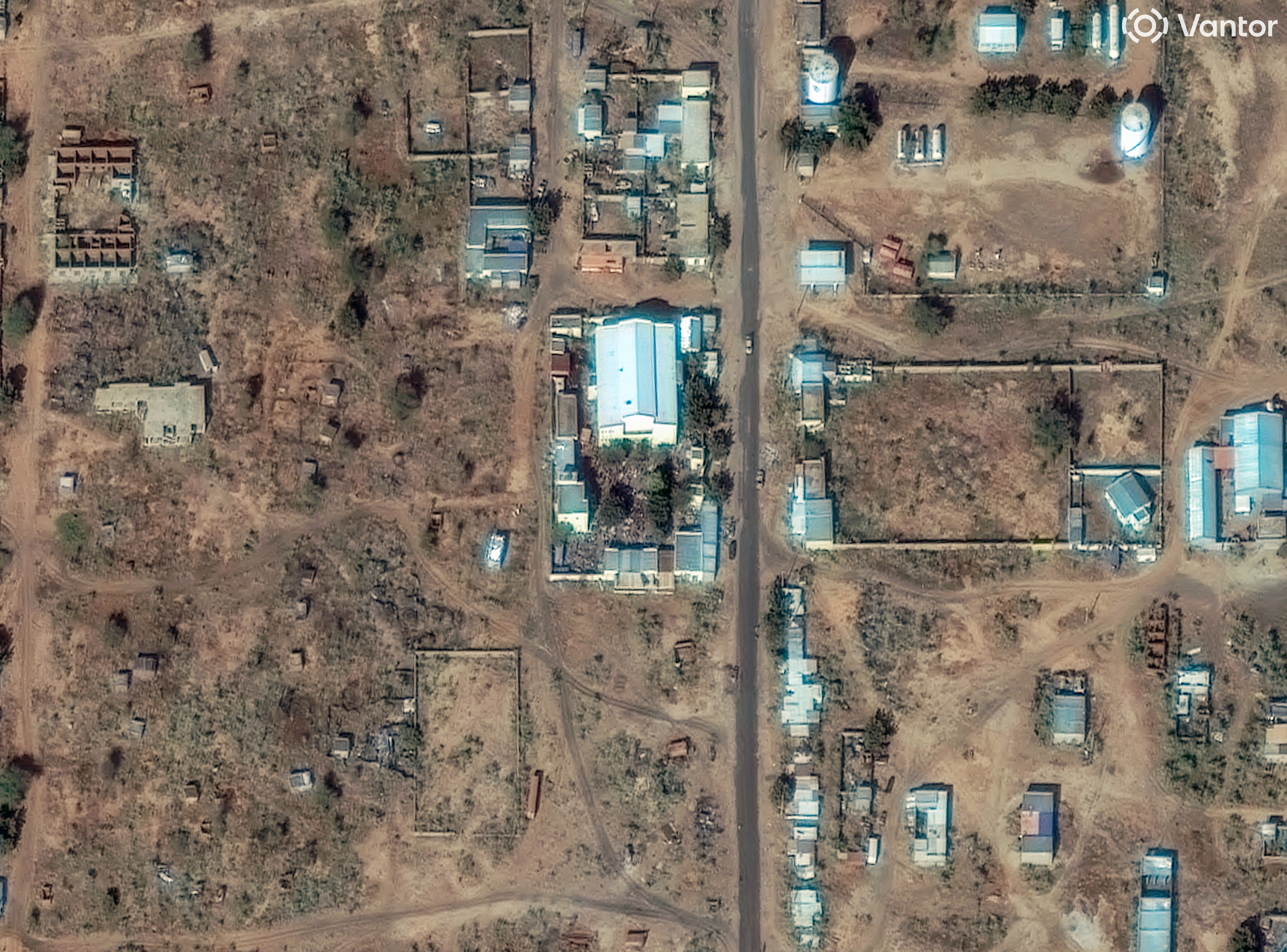 Satellite image of El Fasher’s children’s hospital with what appears to be a mass grave nearby.