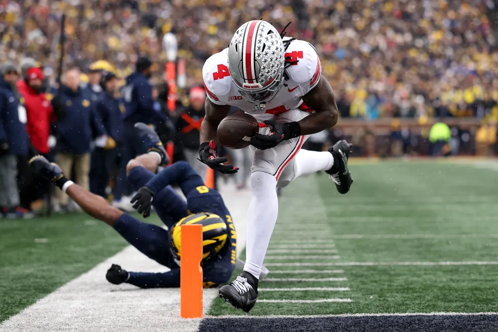 Ohio State's Jeremiah Smith bobbles the ball into the end zone ruled a touchdown against the Michigan Wolverines.