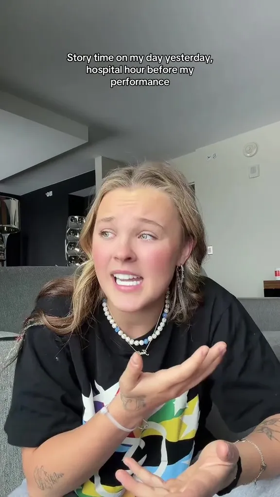 JoJo Siwa telling a story about her hospital visit before a performance.