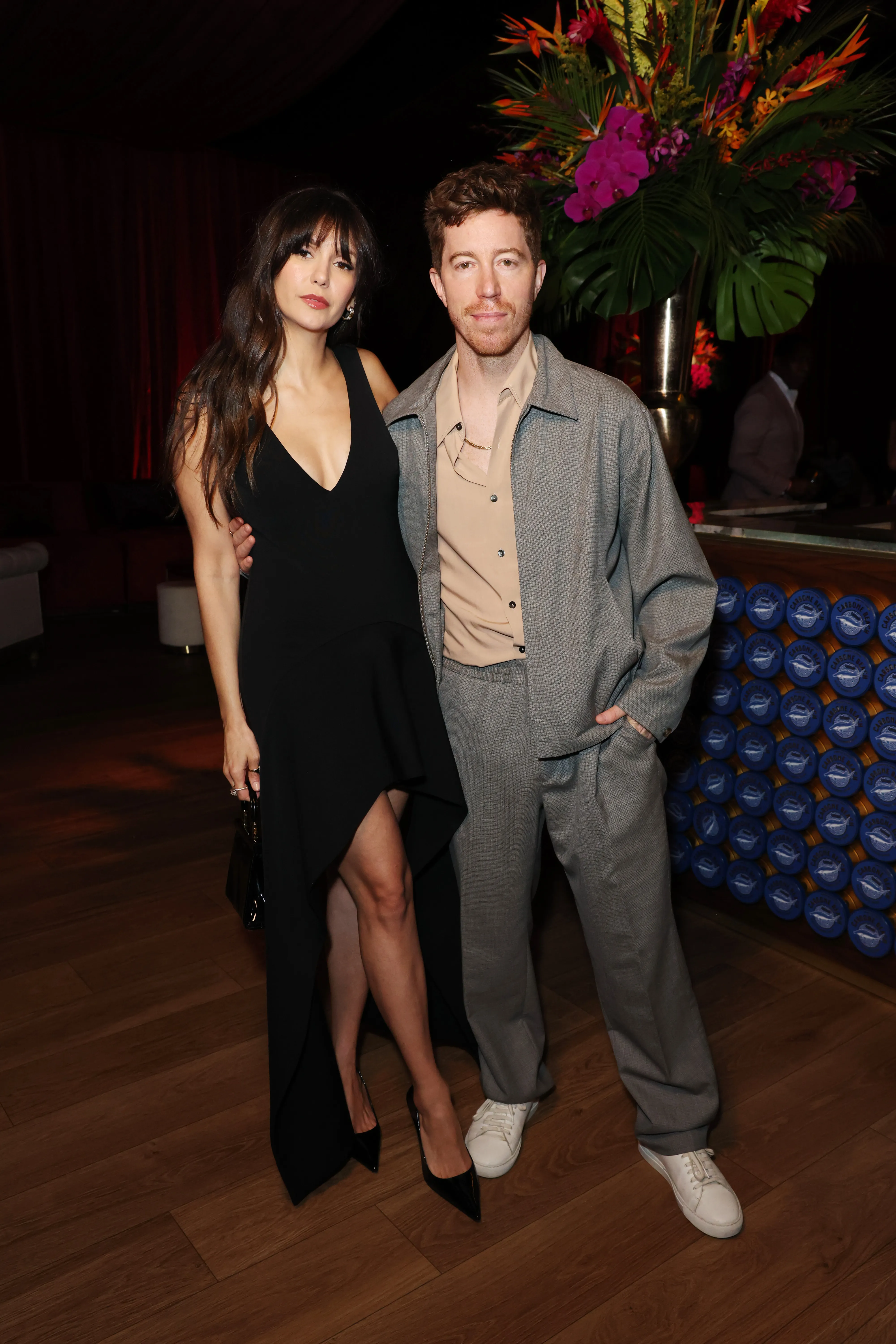 Nina Dobrev and Shaun White attending Amex x CARBONE BEACH 2025.