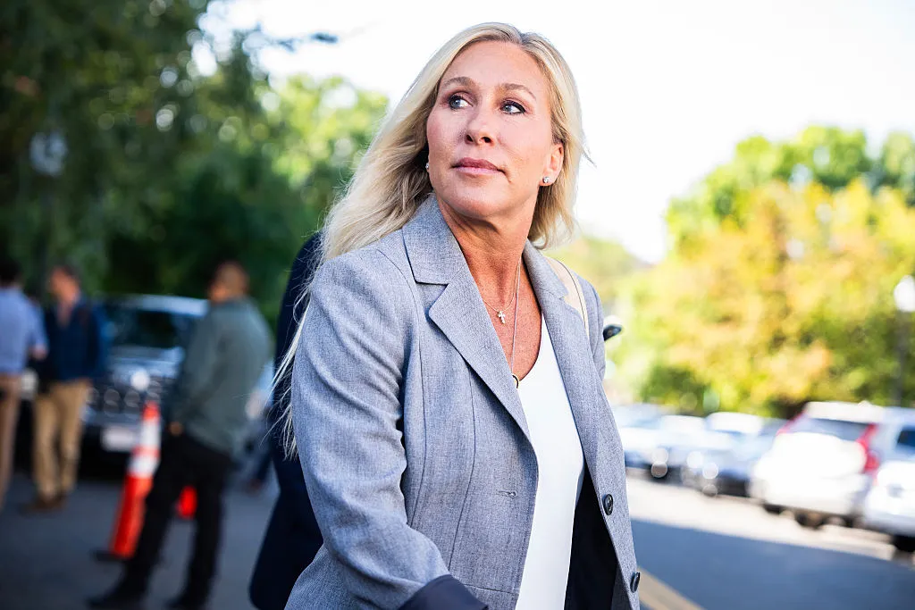 Rep. Marjorie Taylor Greene (R, Ga.) talks with reporters at the Capitol Hill Club on Tuesday, Sept. 9, 2025.