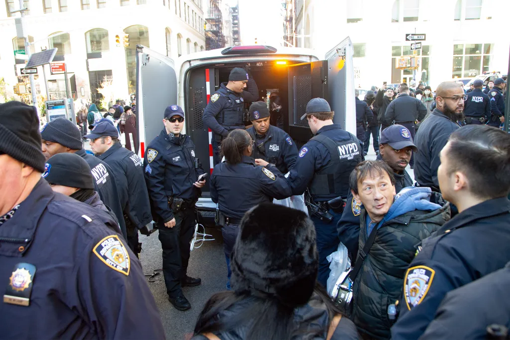 NYPD making arrests after a protest at a federal law enforcement garage where ICE agents were gathered.