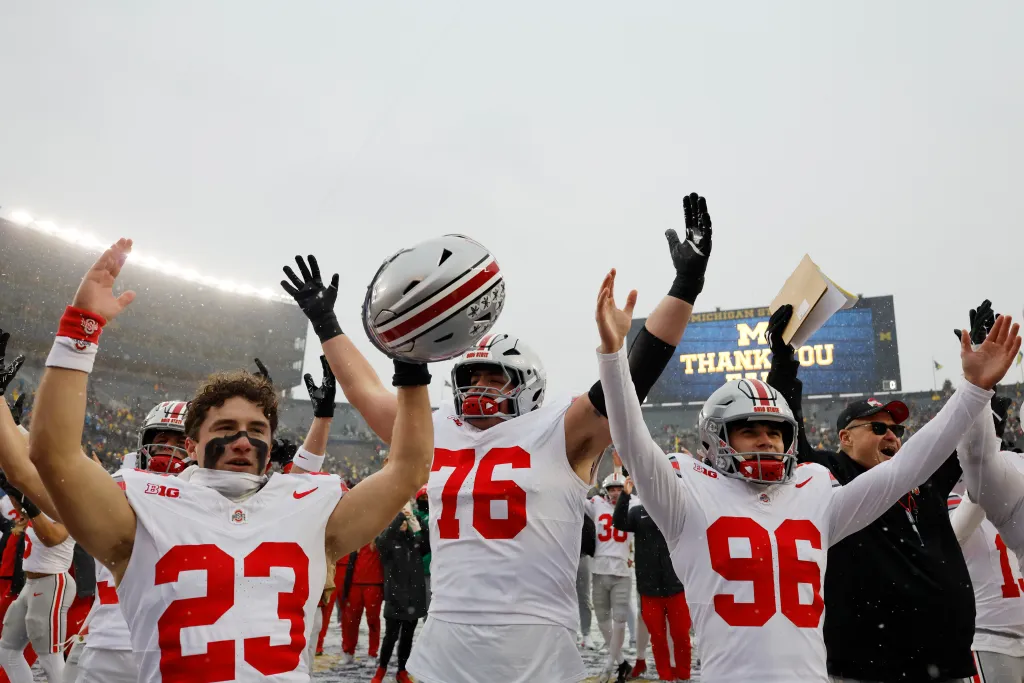 Ohio State players celebrate their rivalry win against Michigan in Ann Arbor on Nov. 29, 2025.