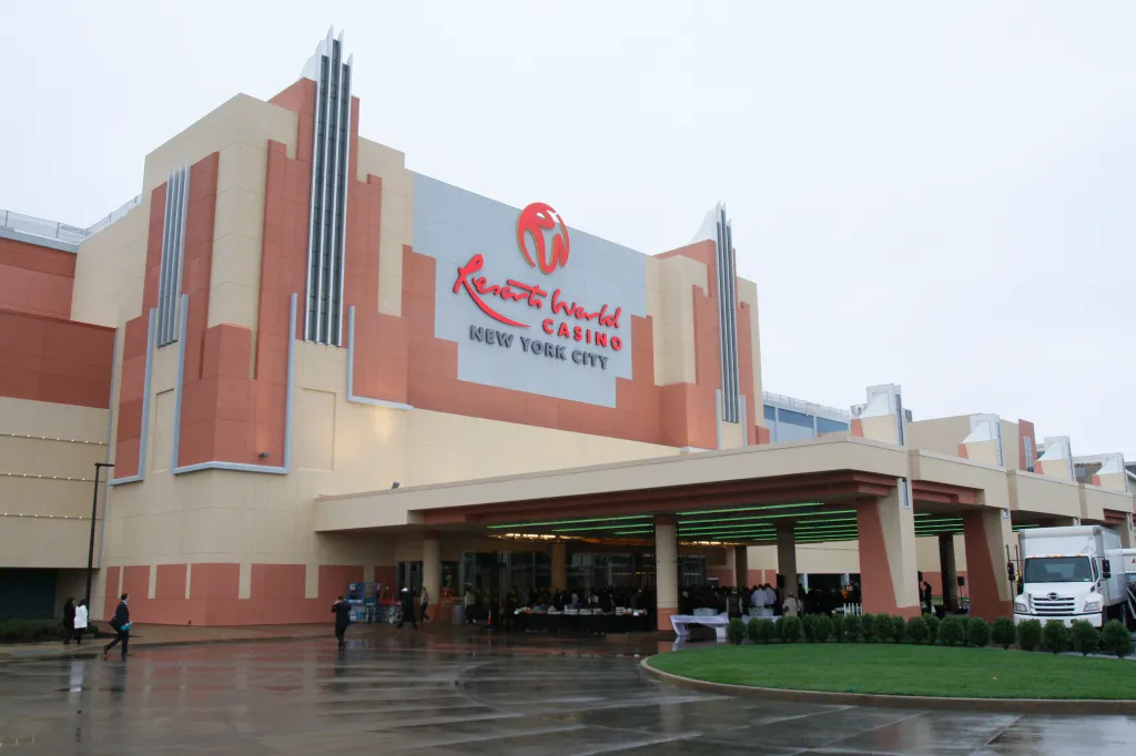 Resorts World Casino building, with its logo on the side and a covered entrance below.