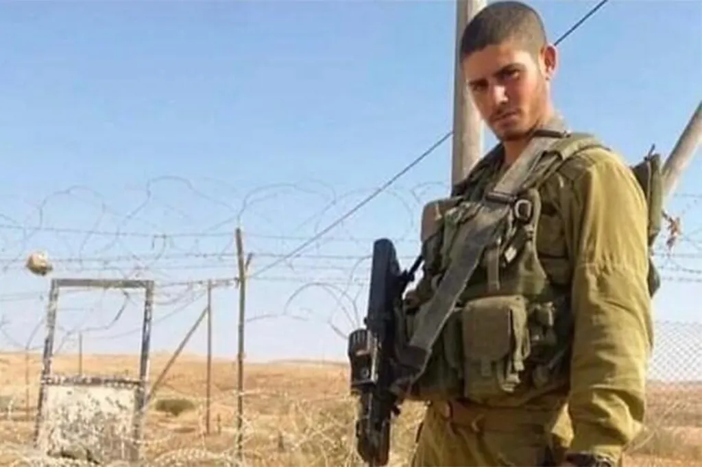Staff Sgt. Or Mizrahi in uniform with a rifle.