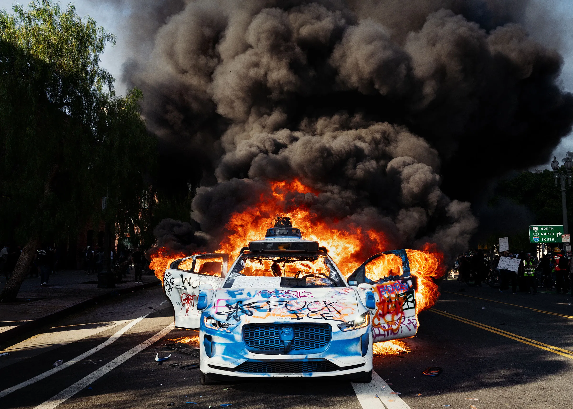 A waymo caught fire from protestors. Downtown, Los Angeles
Copyright @ Ethan Noah Roy