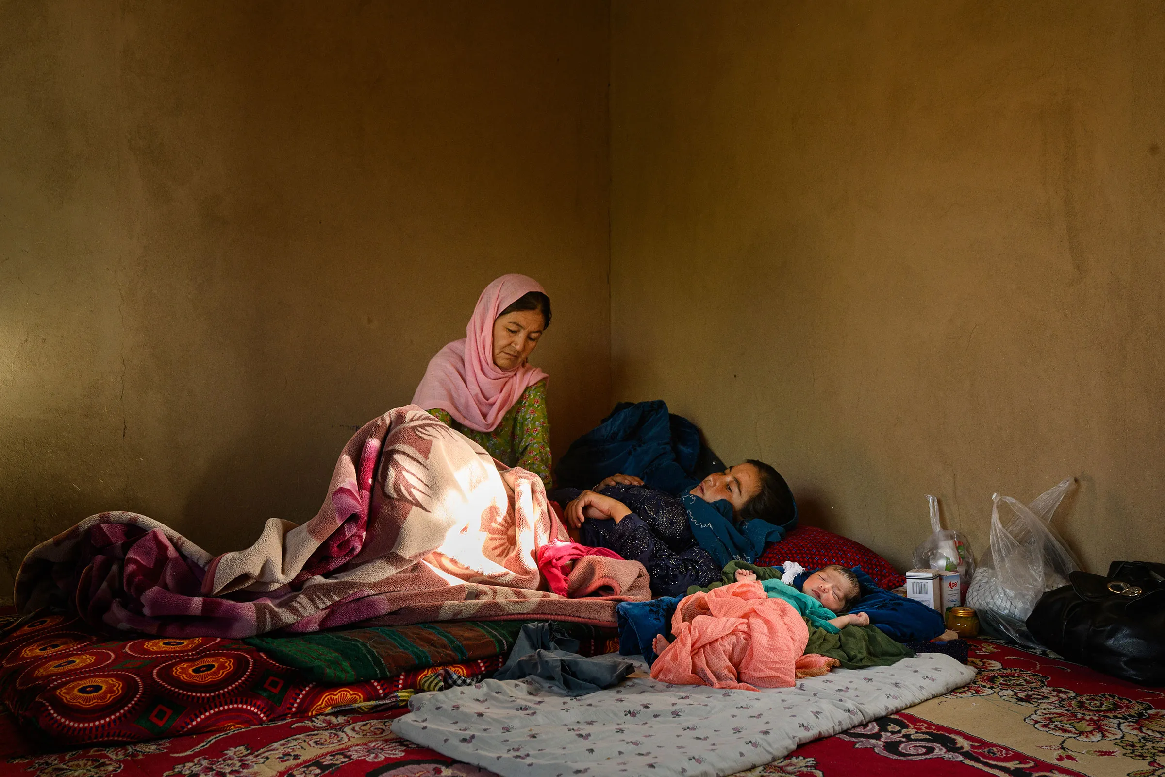 Gulshaman, a 43-year-old midwife, visits Fatemah, 19, whose daughter, Yasmin, was born the previous day, at her home on July 27, 2025, in Waras, a remote and isolated area of Shahristan, a district of Daikundi—one of the hardest-to-reach, most underdeveloped, and poorest provinces of Afghanistan.
She provides postnatal care for both Fatemah and her baby, shares information on how to care for an infant—as Yasmin is Fatemah’s first child—and offers free medecines.
“If the clinic had been closed, I could not have reached the hospital to give birth,” said Fatemah.
Once supplies and Gulshaman’s savings run out, the clinic closure will put pregnant women and children at high risk, as people will be one to three hours’ drive from the nearest hospital. Isolated by mountains and poor roads, they are among the poorest in Afghanistan and cannot afford the $45 to $60 it costs to rent a private car.
Even those who can borrow money to make the trip may arrive too late for a safe delivery. The community will also lose access to general health services, including crucial prenatal monitoring