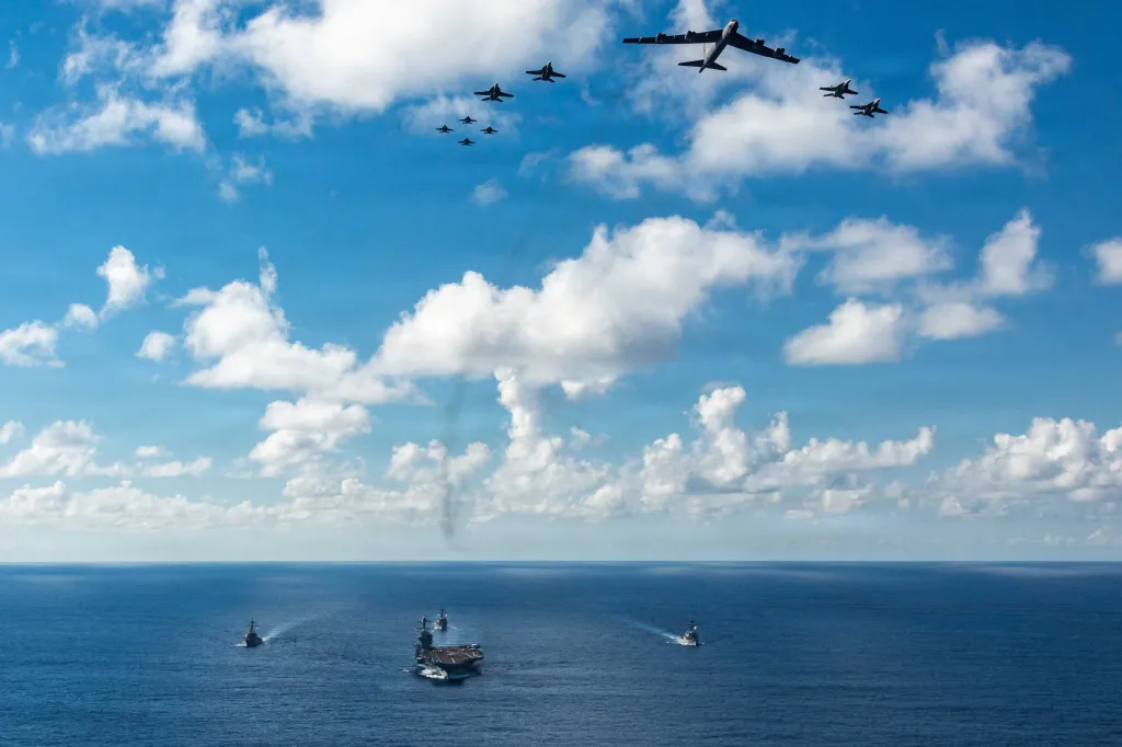 The Gerald R. Ford Carrier Strike Group with a B-52 Stratofortress and F/A-18E/F Super Hornets in the Atlantic Ocean.