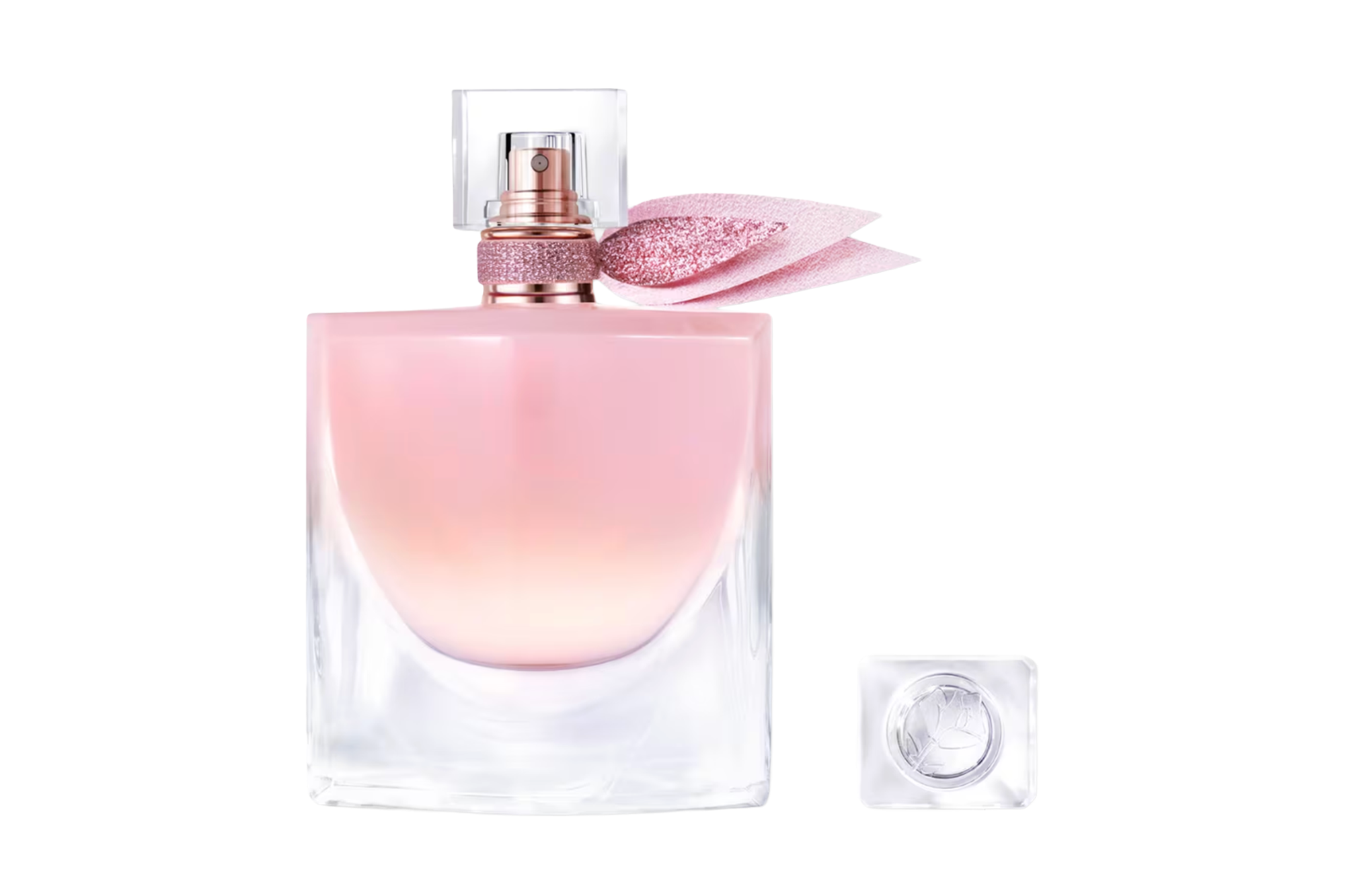 Perfume bottle with a pink liquid and a sparkly pink bow.