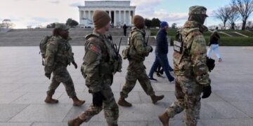 U.S. halts all asylum decisions after shooting of National Guard members