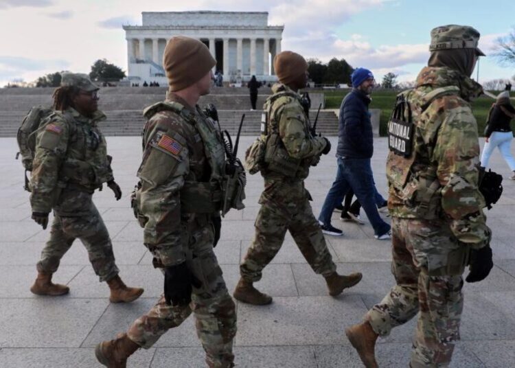 U.S. halts all asylum decisions after shooting of National Guard members