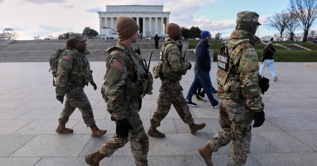 U.S. halts all asylum decisions after shooting of National Guard members