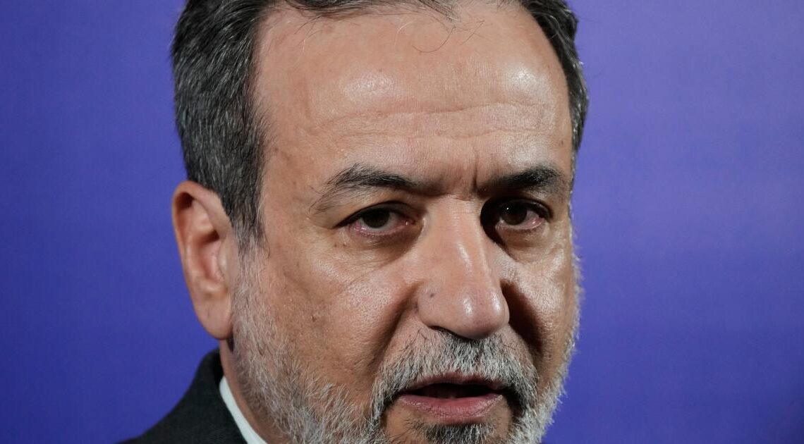 Iran’s foreign minister says the nation is no longer enriching uranium at any site in the country