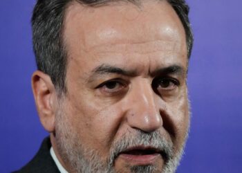 Iran’s foreign minister says the nation is no longer enriching uranium at any site in the country